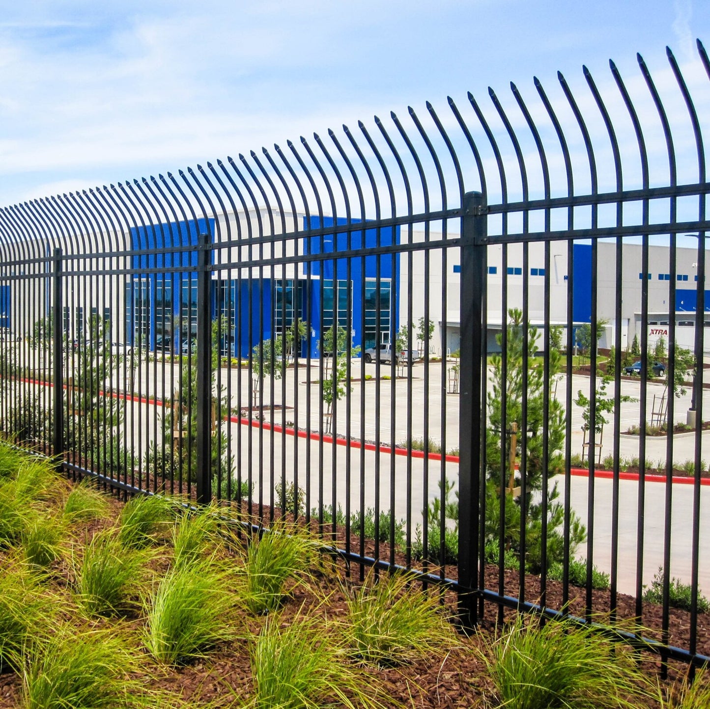 Heavy duty, anti-climb fencing, with press spear terminations in front of a secure data server warehouse