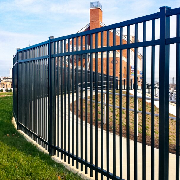 Flat top extruded bottom, three rail, heavy duty panels surrounding a sports stadium