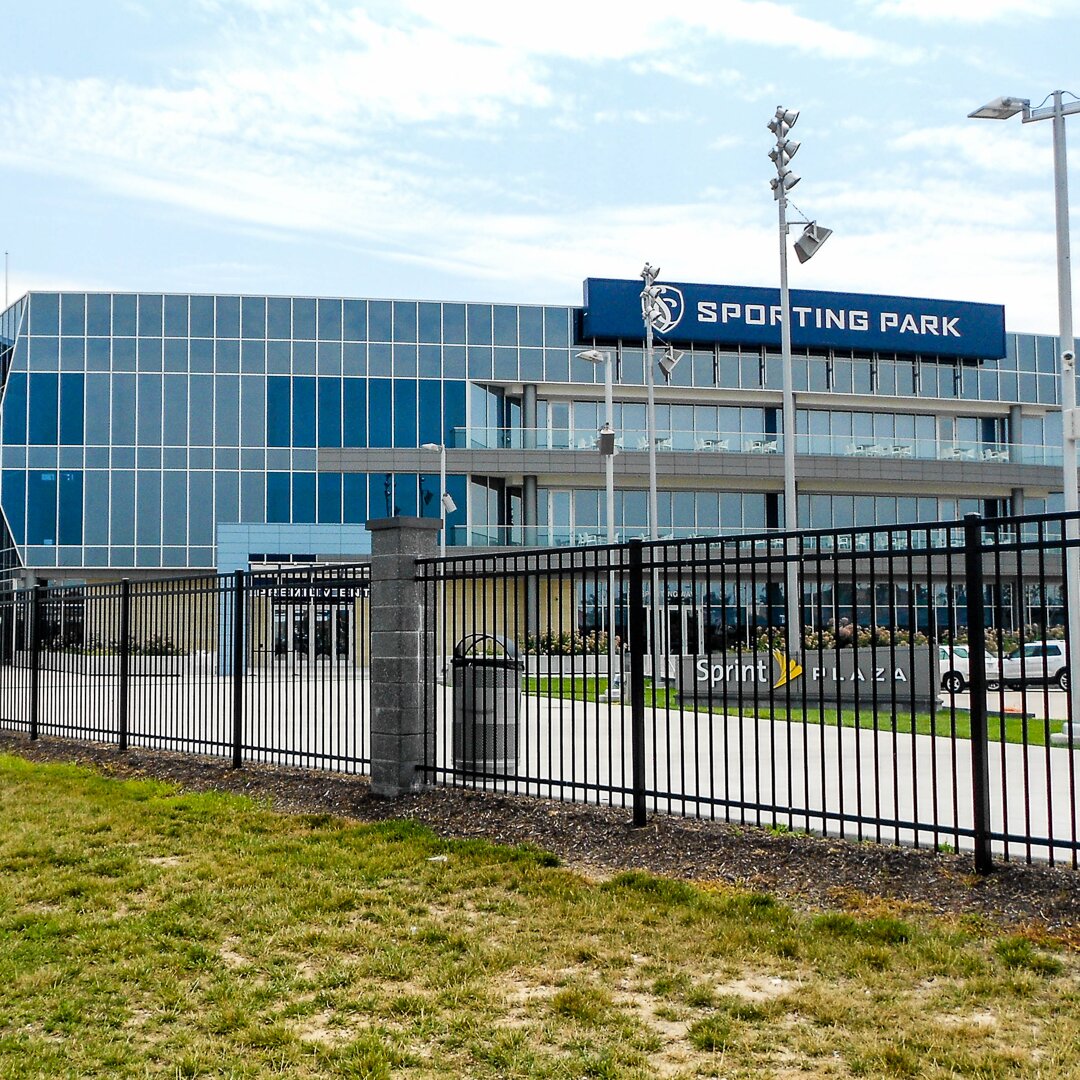 Flat top extruded bottom, three real fencing surrounding the sprint plaza sporting park